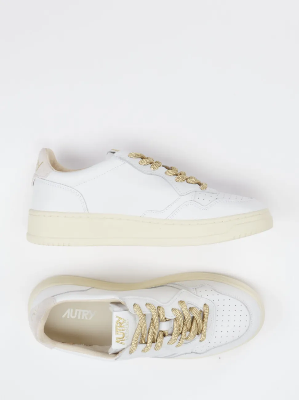 Autry – Sneaker aus Kalbleder mit Goldakzenten