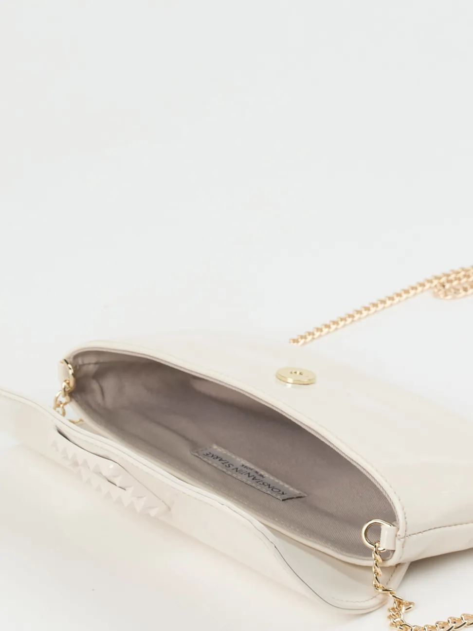 Konstantin Starke – Clutch aus Lackleder Elfenbeinweiß