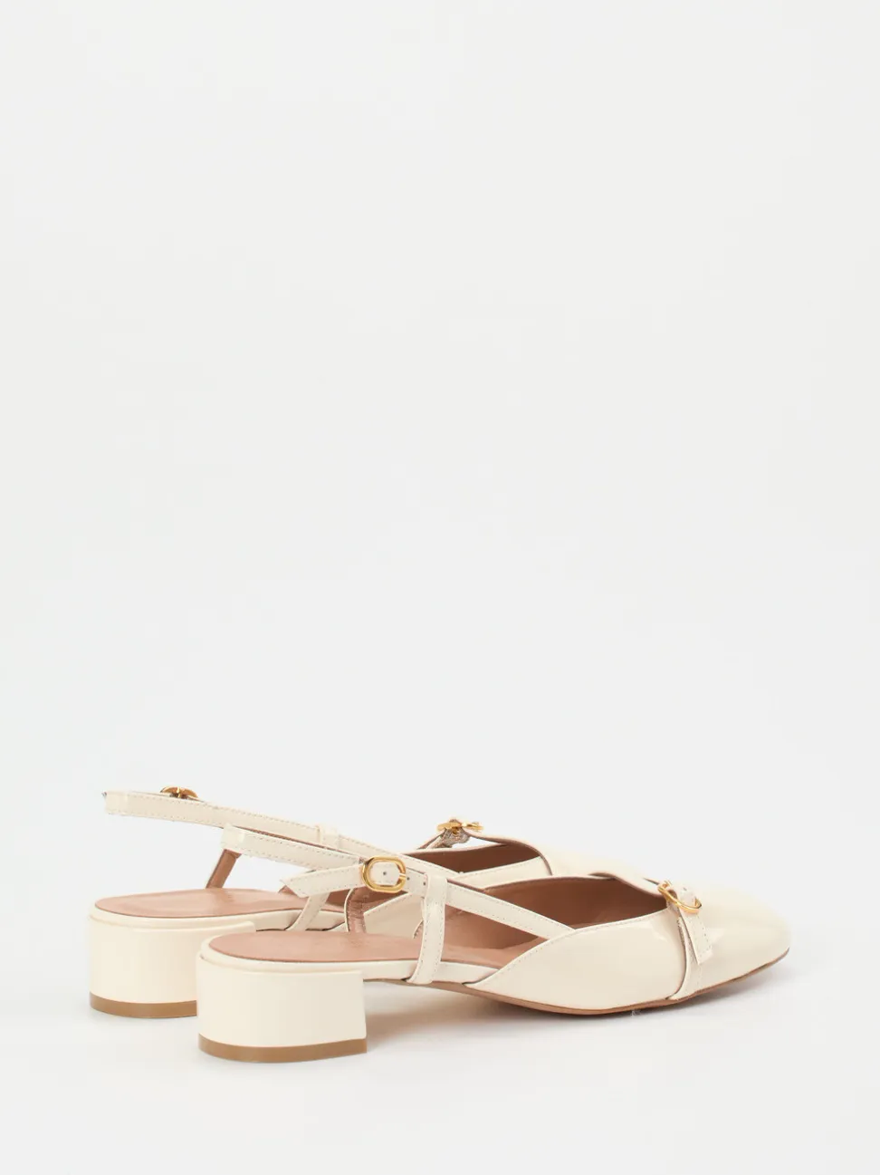 Konstantin Starke – Slingback-Pumps aus Lackleder cremeweiß