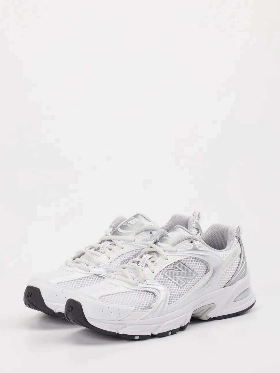 New Balance – Sneaker aus Textil in Weiß-Silber