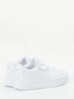 Puma – Sneaker aus Leder in Weiß mit Goldlogos