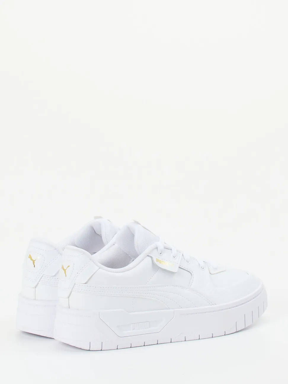 Puma – Sneaker aus Leder in Weiß mit Goldlogos