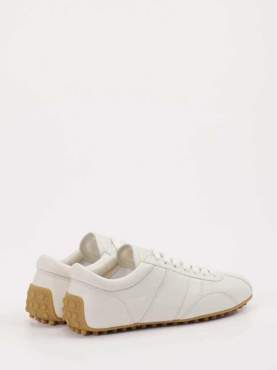 Tod's – Sneaker aus Lammleder in Offwhite