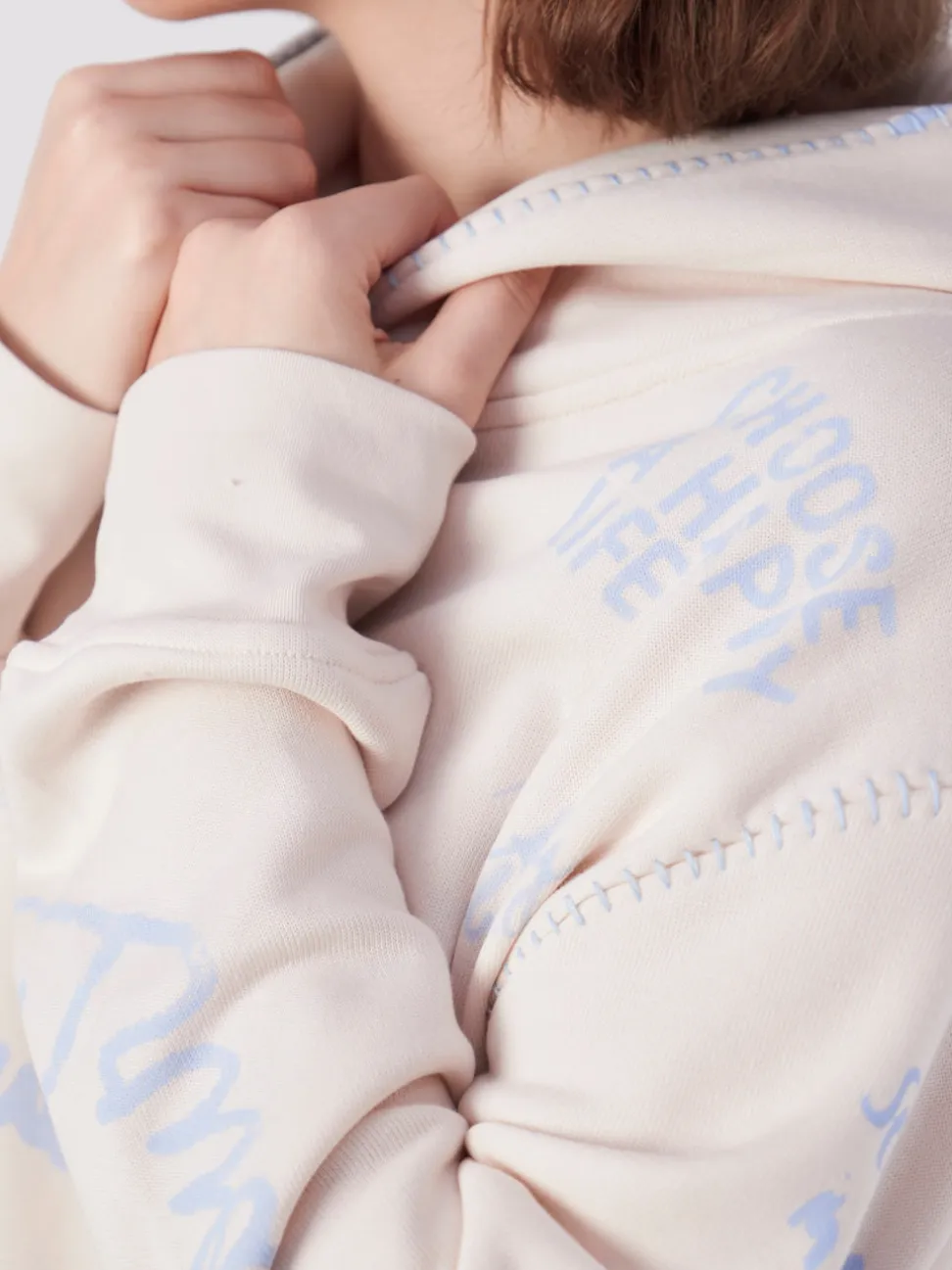 Yippie Hippie – Kapuzenpullover aus Textil in Beige